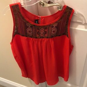 red patterned blouse!